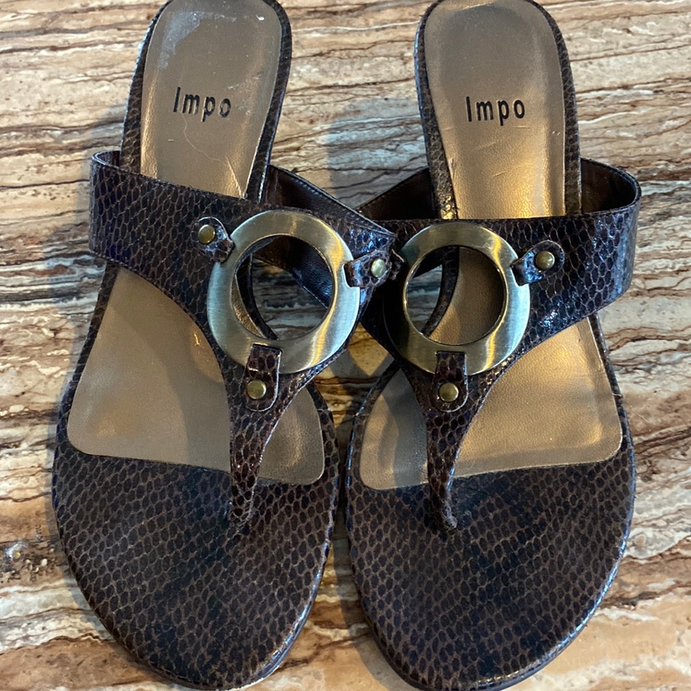 2/$25. Ladies size 7 sandals made by Impo. Vegan leather.